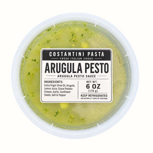 New Soul Costantini Pasta arugula pesto in a 6oz clear plastic container with a white label