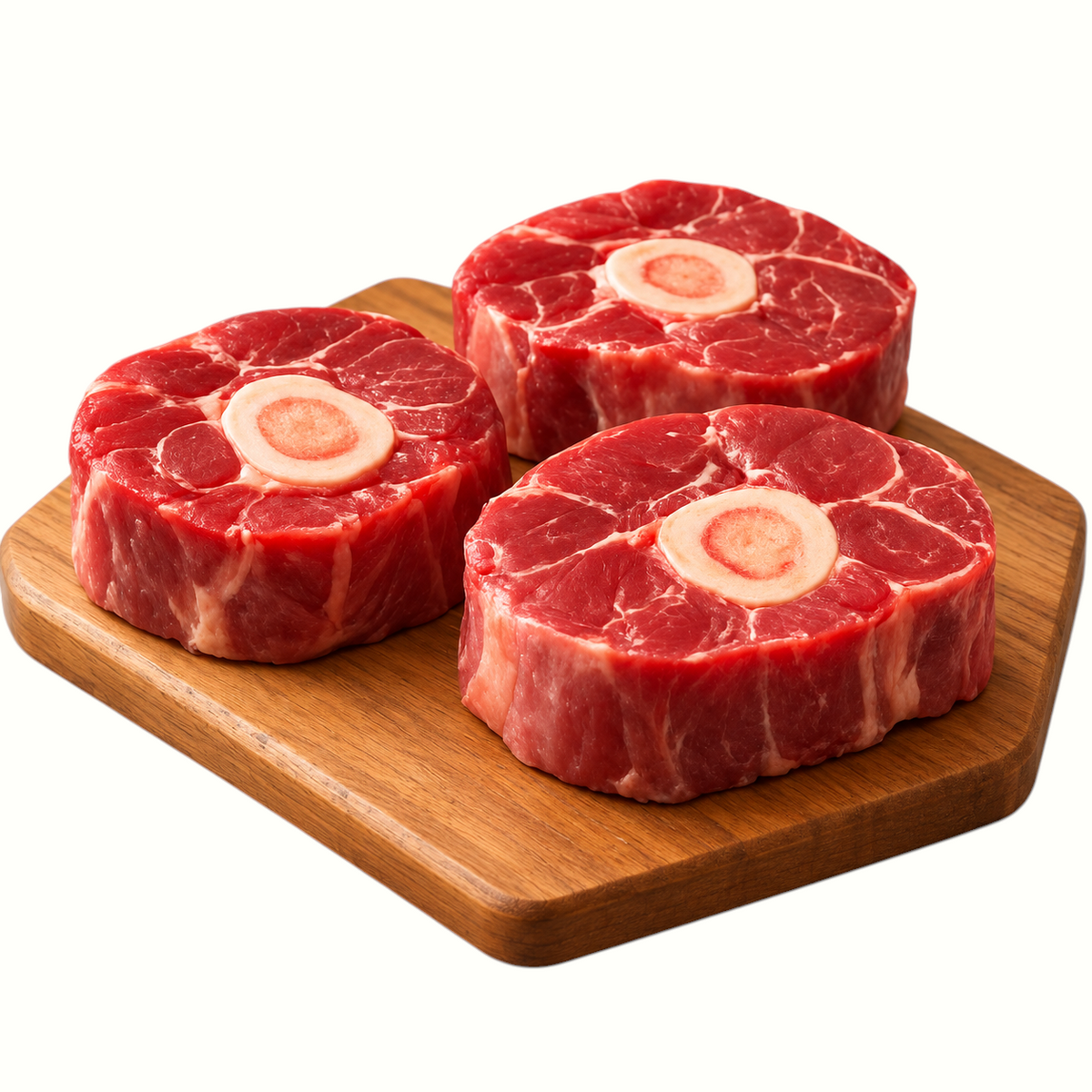 New Soul grass-fed beef shank bones for osso buco on a wooden cutting board, raw and rich in marrow.