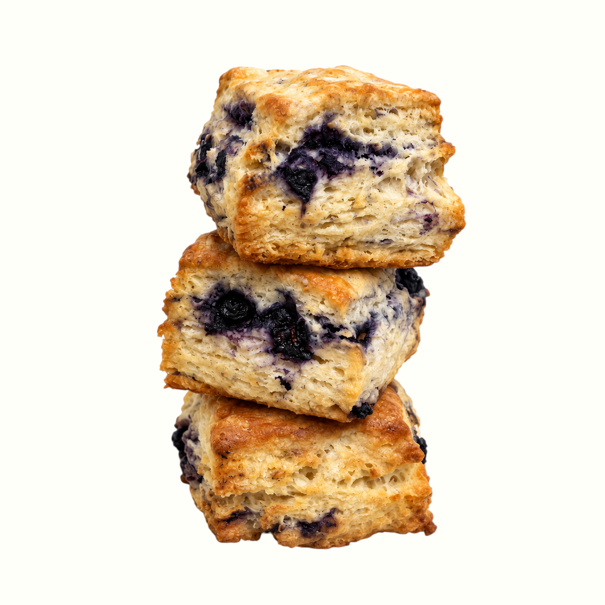 New Soul Roll Dat Deaux blueberry biscuits stacked vertically, showing golden crust and wild blueberry pieces.