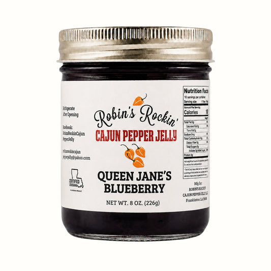 New Soul Queen Jane's blueberry habanero pepper jelly in an 8 oz glass jar with a metallic lid