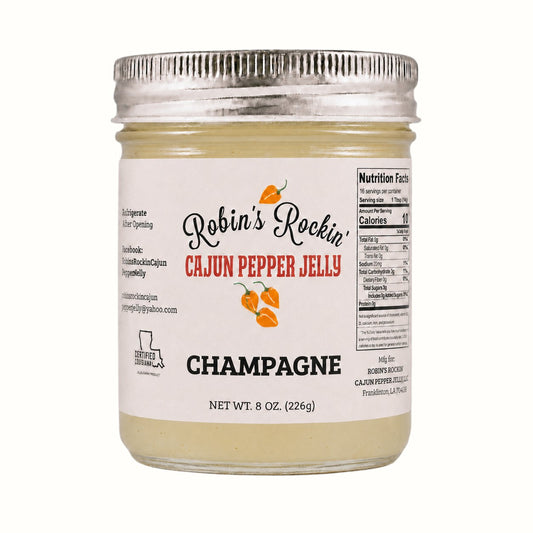 New Soul Robin's Rockin' champagne habanero pepper jelly in an 8 oz glass jar with a white label.