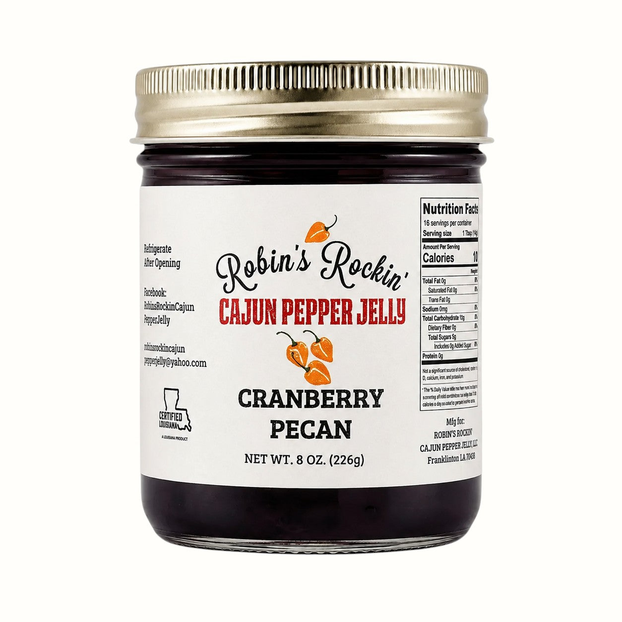 New Soul Robin's Rockin' cranberry pecan pepper jelly in a glass jar with a gold lid and white label.