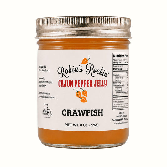 New Soul Robin's Rockin' Crawfish Cajun pepper jelly in an 8 oz glass jar with habanero and Creole boil seasoning.
