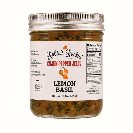 New Soul Robin's Rockin' lemon basil cajun pepper jelly in a glass jar with visible herbs and habanero pieces.