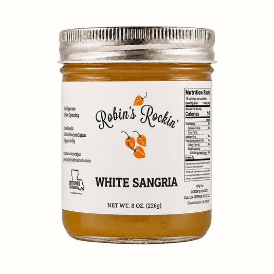 New Soul Robin's Rockin' White Sangria pepper jelly in an 8 oz glass jar with habanero pepper illustrations